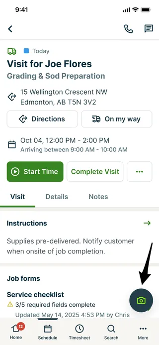 A screenshot with a markup arrow highlighting the camera button in the Jobber app.